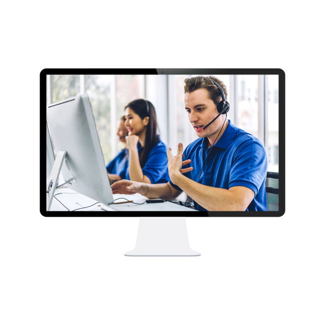 A computer screen shows workers in matching shirts in front of computers with headsets on, talking on calls. 